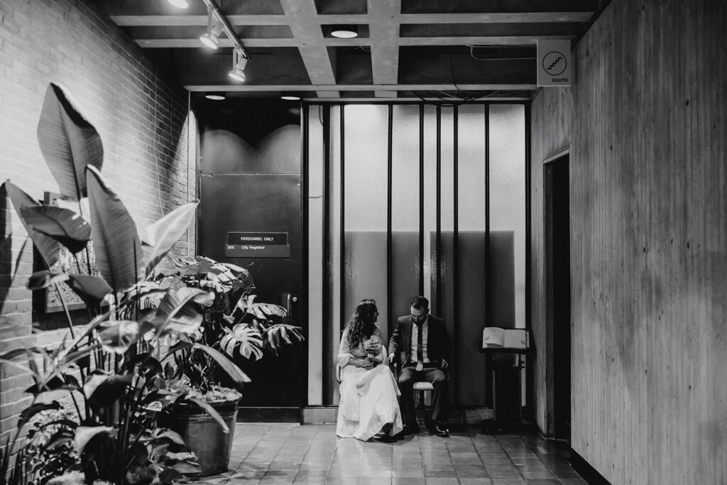 Waiting outside room 201 as you elope at Boston City Hall